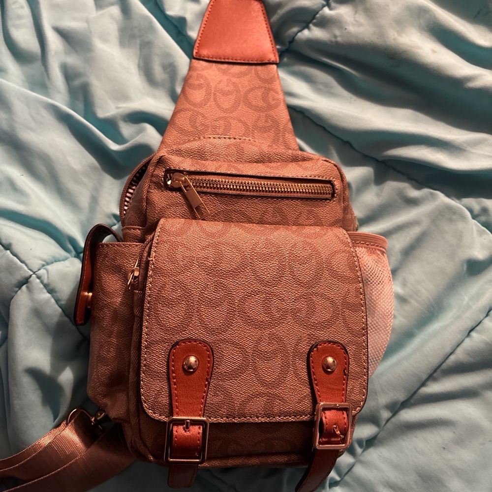 Multiple pocket sling bag
